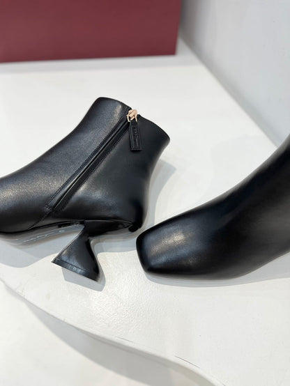 Sculptural-Heel Zip Boots
